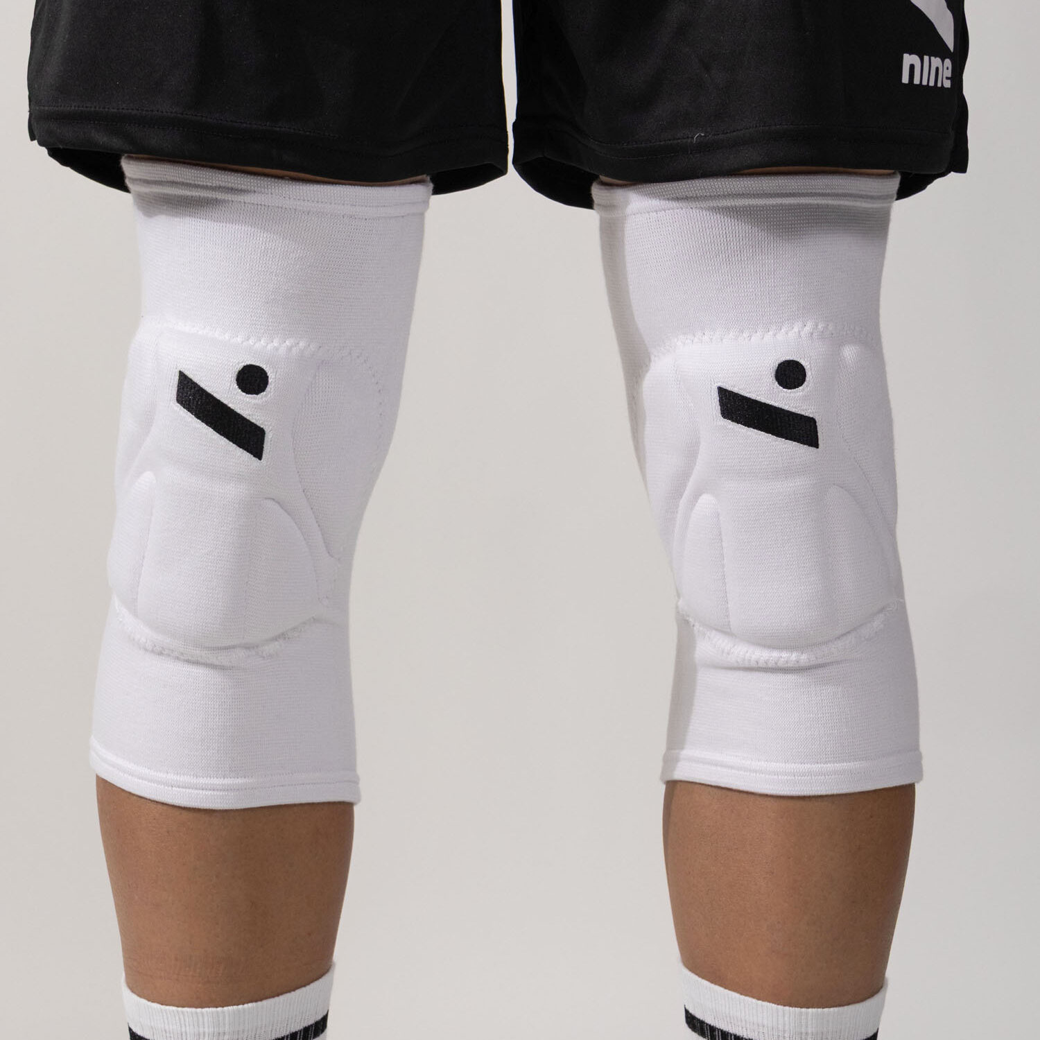 ninesquared-new-shield-white-img1-U